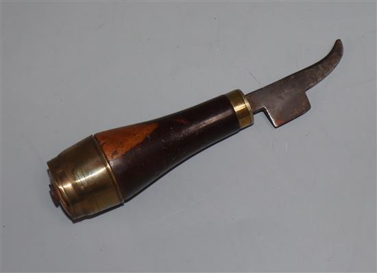 A Shoemakers hand tool with lignum vitae handle